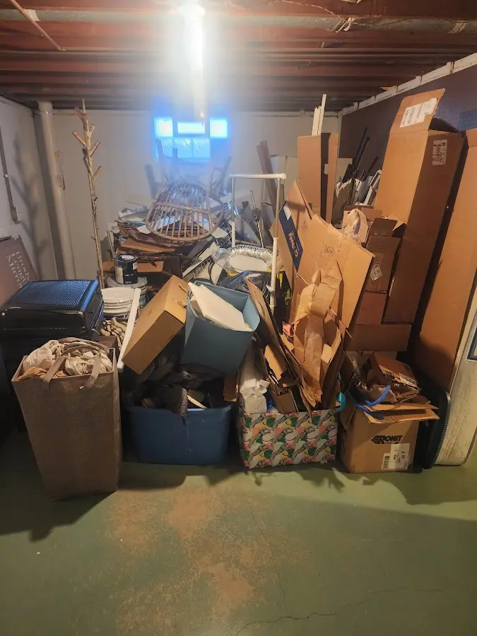 Roll-off dumpster container at job site for Concrete Dumpster Rental in Pearland